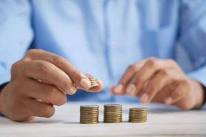 A man counting cents